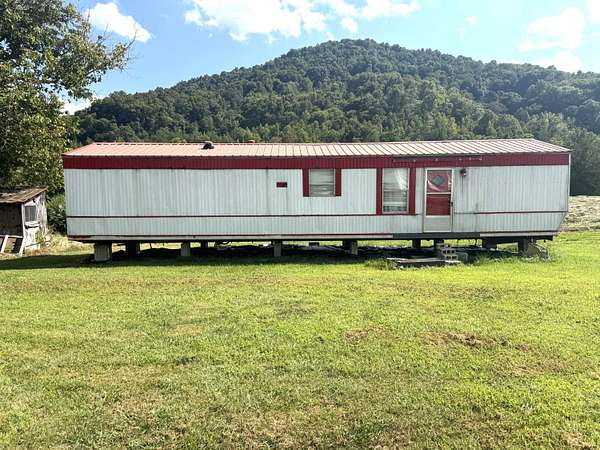 7.69 Acres of Land with Home for Sale in Barbourville, Kentucky