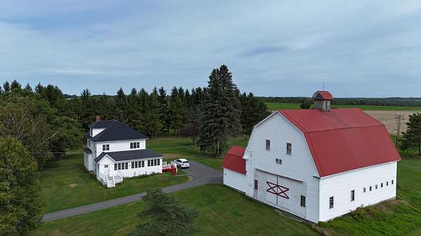 9 Acres of Land with Home for Sale in Washburn, Maine