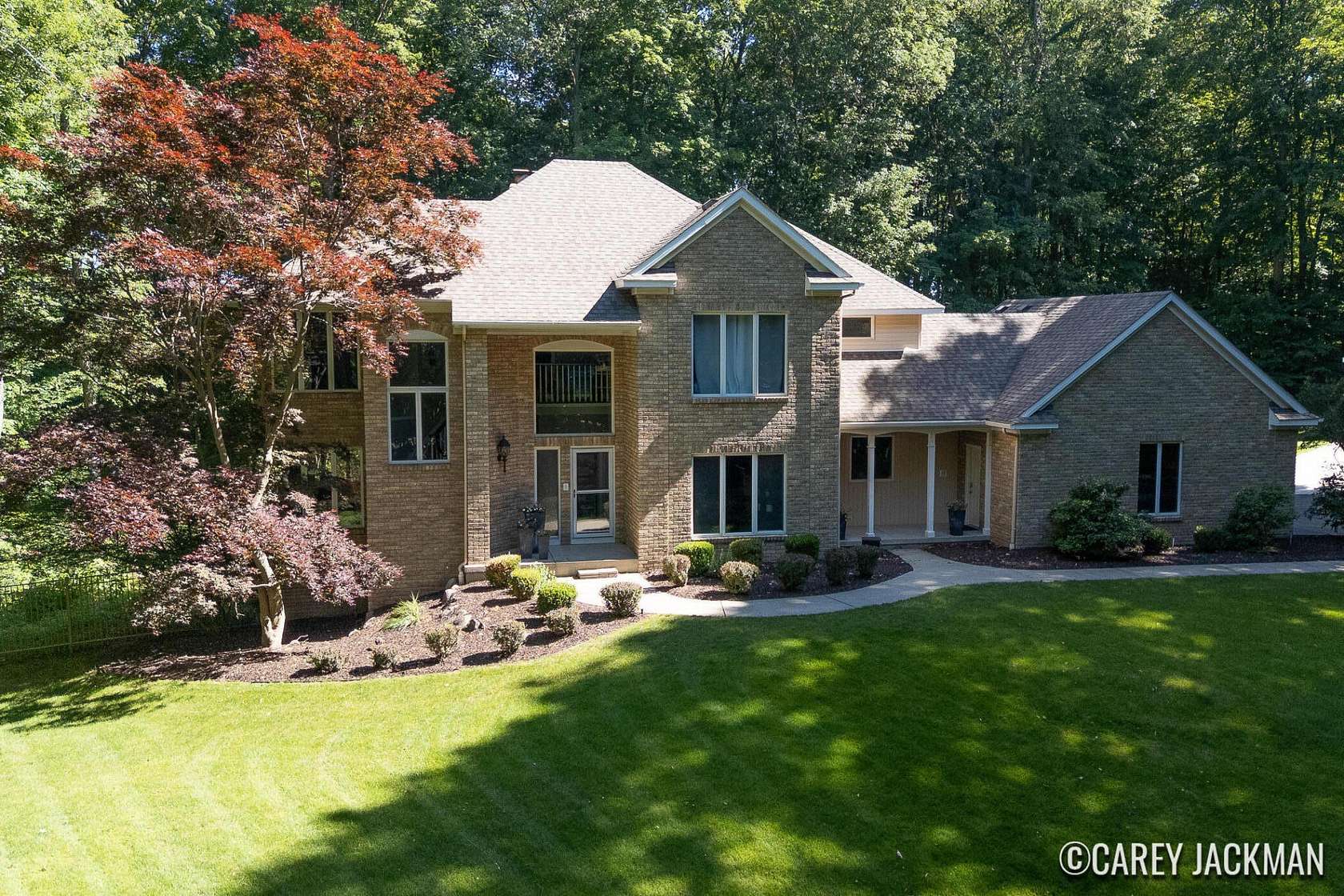 5 Acres of Land with Home for Sale in Comstock Park, Michigan