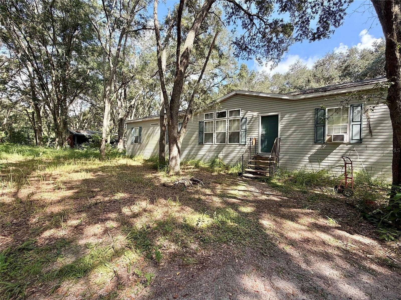 4.63 Acres of Land with Home for Sale in Leesburg, Florida