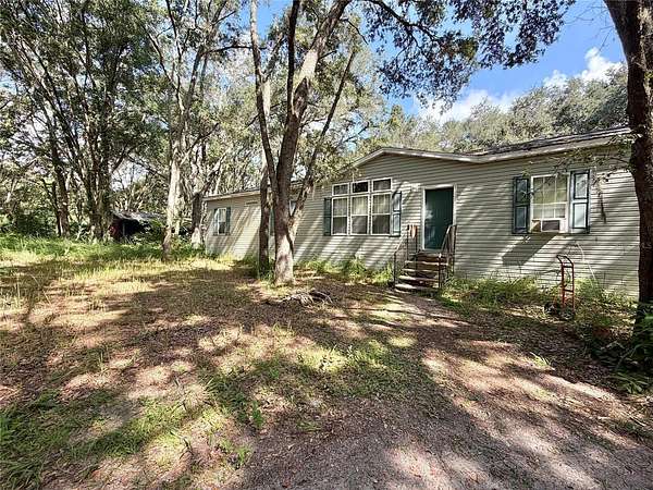 4.63 Acres of Land with Home for Sale in Leesburg, Florida