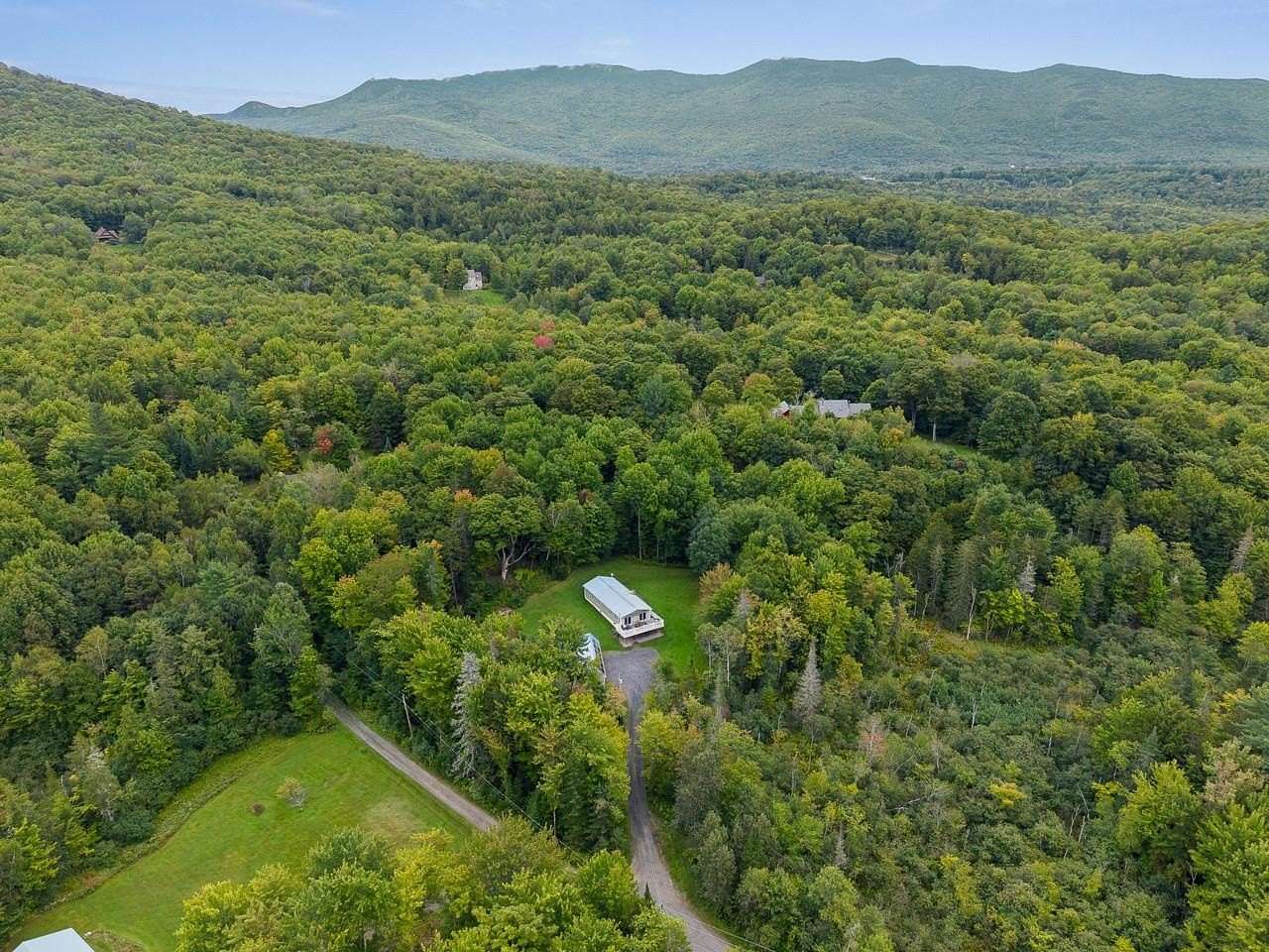 2.75 Acres of Land with Home for Sale in Waterbury, Vermont