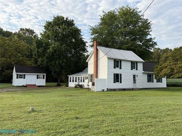 8.68 Acres of Land with Home for Sale in Topping, Virginia