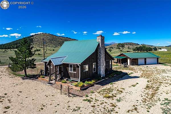 5.26 Acres of Land with Home for Sale in Cotopaxi, Colorado