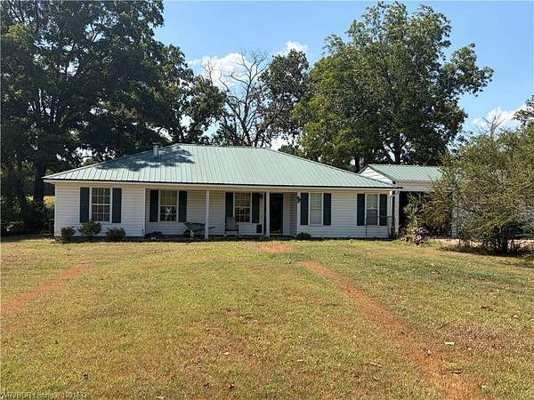 1.79 Acres of Land with Home for Auction in Van Buren, Arkansas