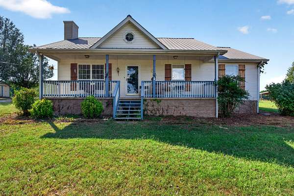 16.6 Acres of Land with Home for Auction in Rock Island, Tennessee