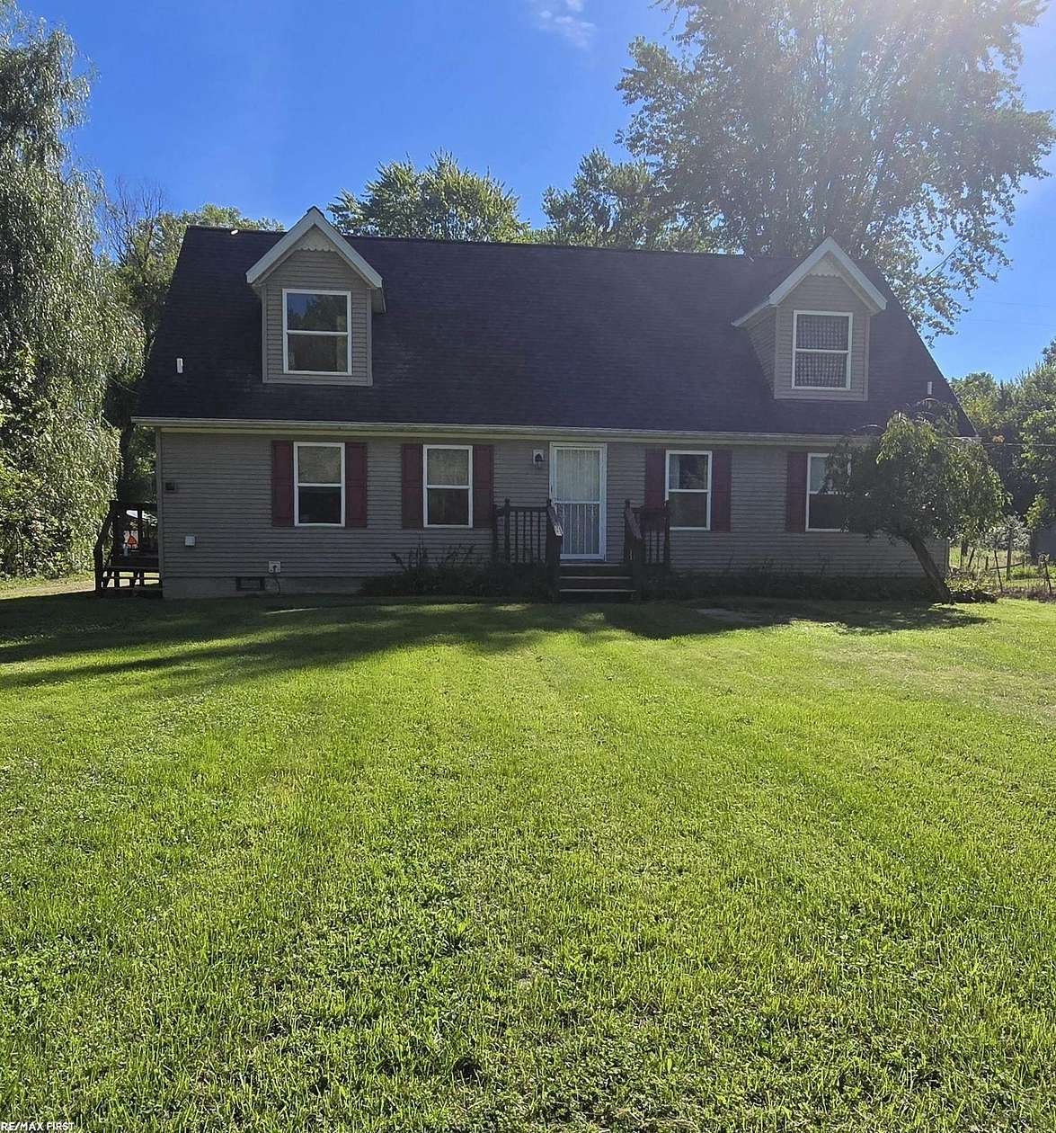 2.68 Acres of Land with Home for Sale in Casco, Michigan