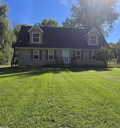 2.68 Acres of Land with Home for Sale in Casco, Michigan