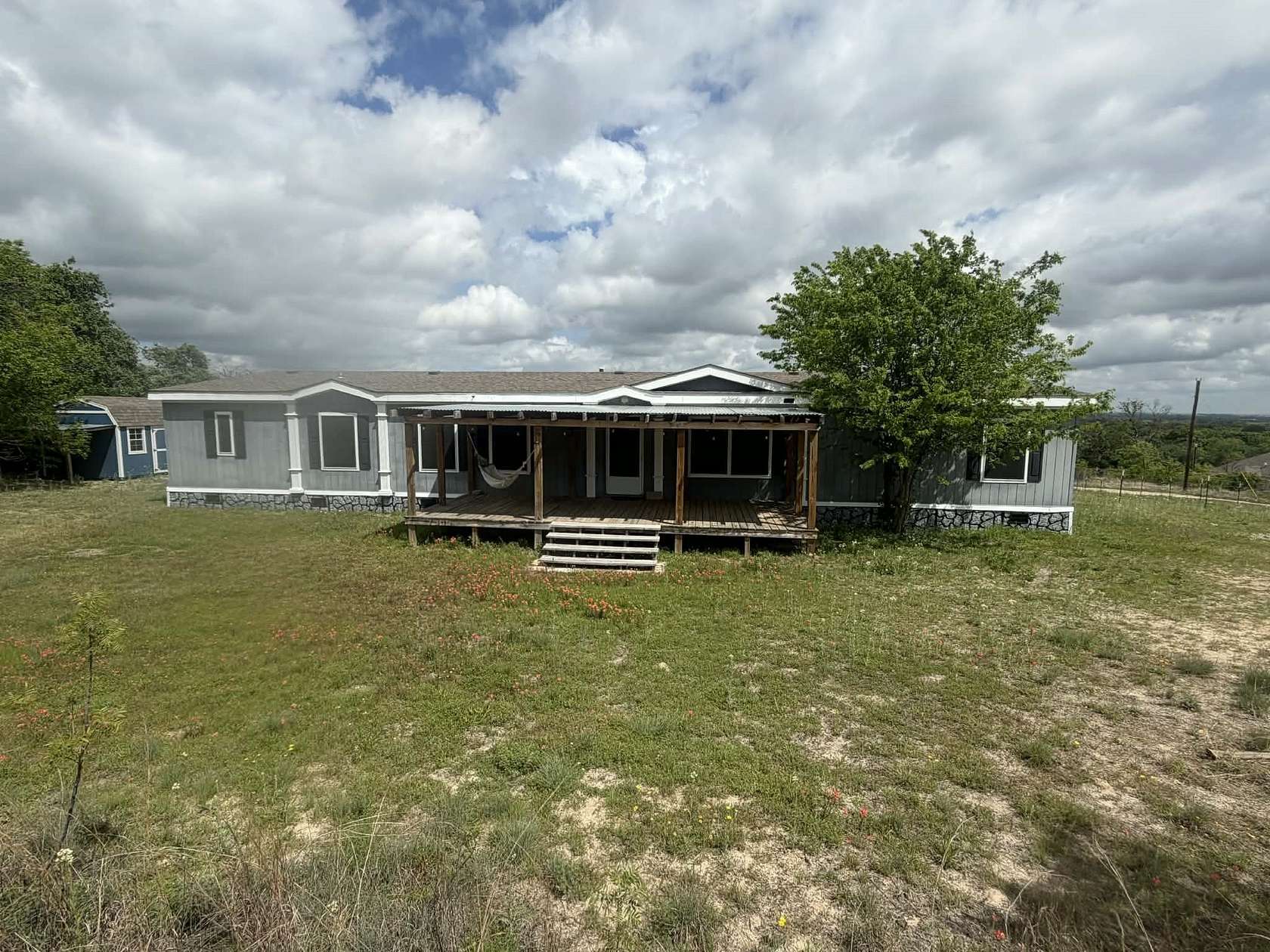 5 Acres of Land with Home for Sale in Springtown, Texas