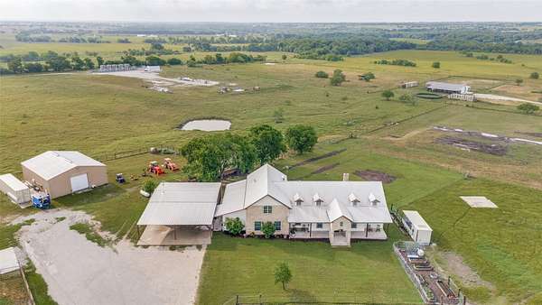 32.4 Acres of Agricultural Land with Home for Sale in Justin, Texas