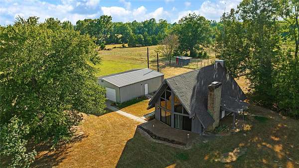 20.3 Acres of Land with Home for Sale in Blossom, Texas