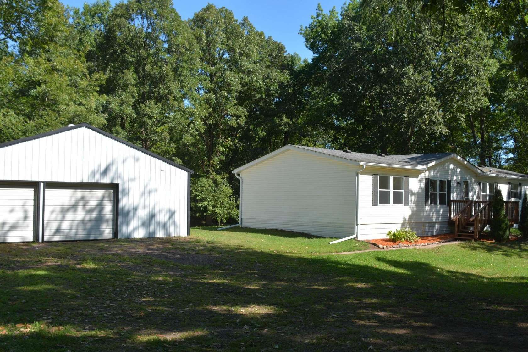 5 Acres of Land with Home for Sale in Hinckley, Minnesota