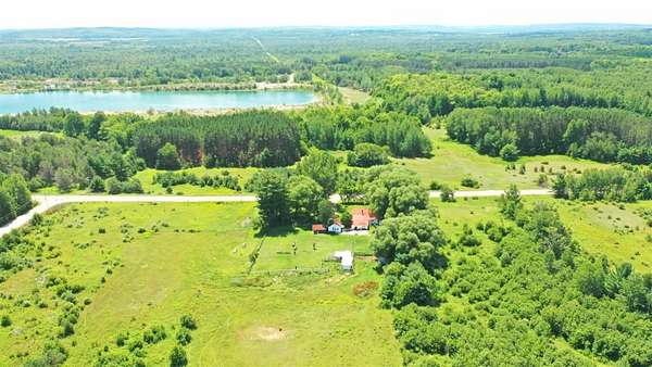 13 Acres of Land with Home for Sale in Brutus, Michigan
