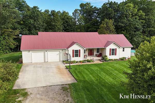 72.6 Acres of Recreational Land with Home for Sale in Twin Lake, Michigan