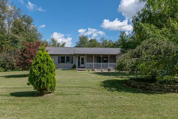 7.5 Acres of Land with Home for Sale in Osseo, Michigan