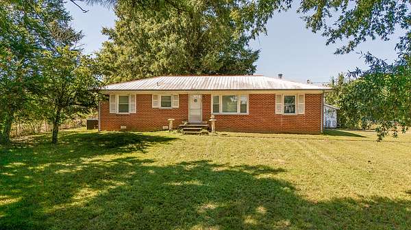 21.5 Acres of Land with Home for Auction in Readyville, Tennessee