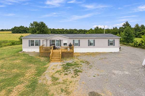 5.54 Acres of Land with Home for Sale in Smithville, Tennessee