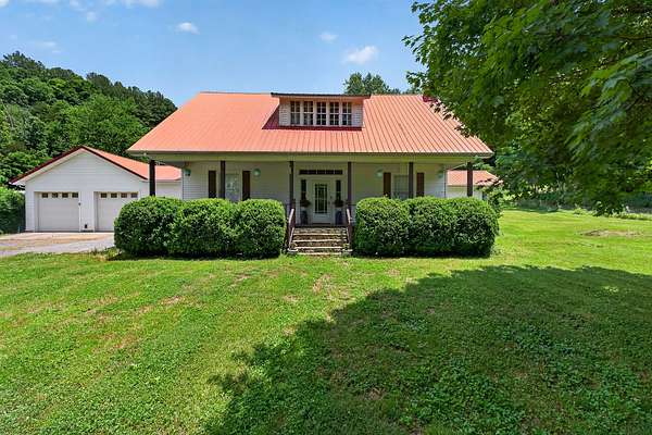 10.3 Acres of Land with Home for Sale in Whitleyville, Tennessee