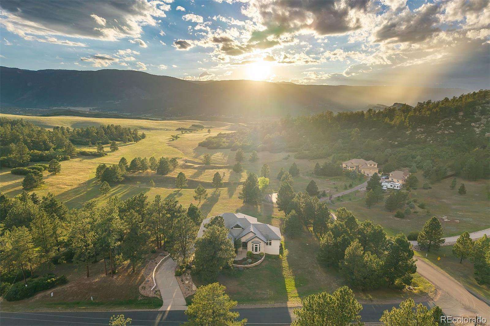 4.38 Acres of Land with Home for Sale in Larkspur, Colorado
