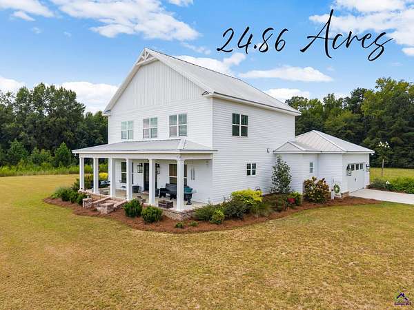 24.9 Acres of Recreational Land with Home for Sale in Cochran, Georgia