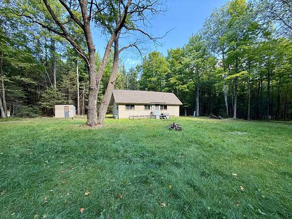 9.24 Acres of Land with Home for Sale in Tomahawk, Wisconsin