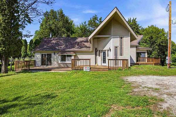 14.2 Acres of Recreational Land with Home for Sale in Solon, Iowa