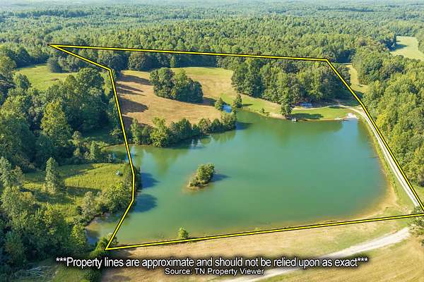 11.3 Acres of Land with Home for Sale in Holladay, Tennessee
