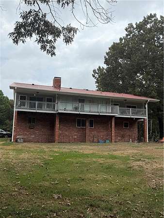 14.9 Acres of Recreational Land with Home for Sale in Knoxville, Arkansas