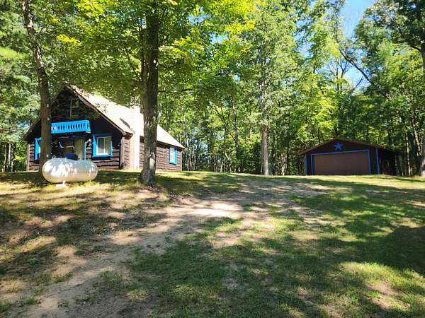 6.55 Acres of Land with Home for Sale in Baldwin, Michigan