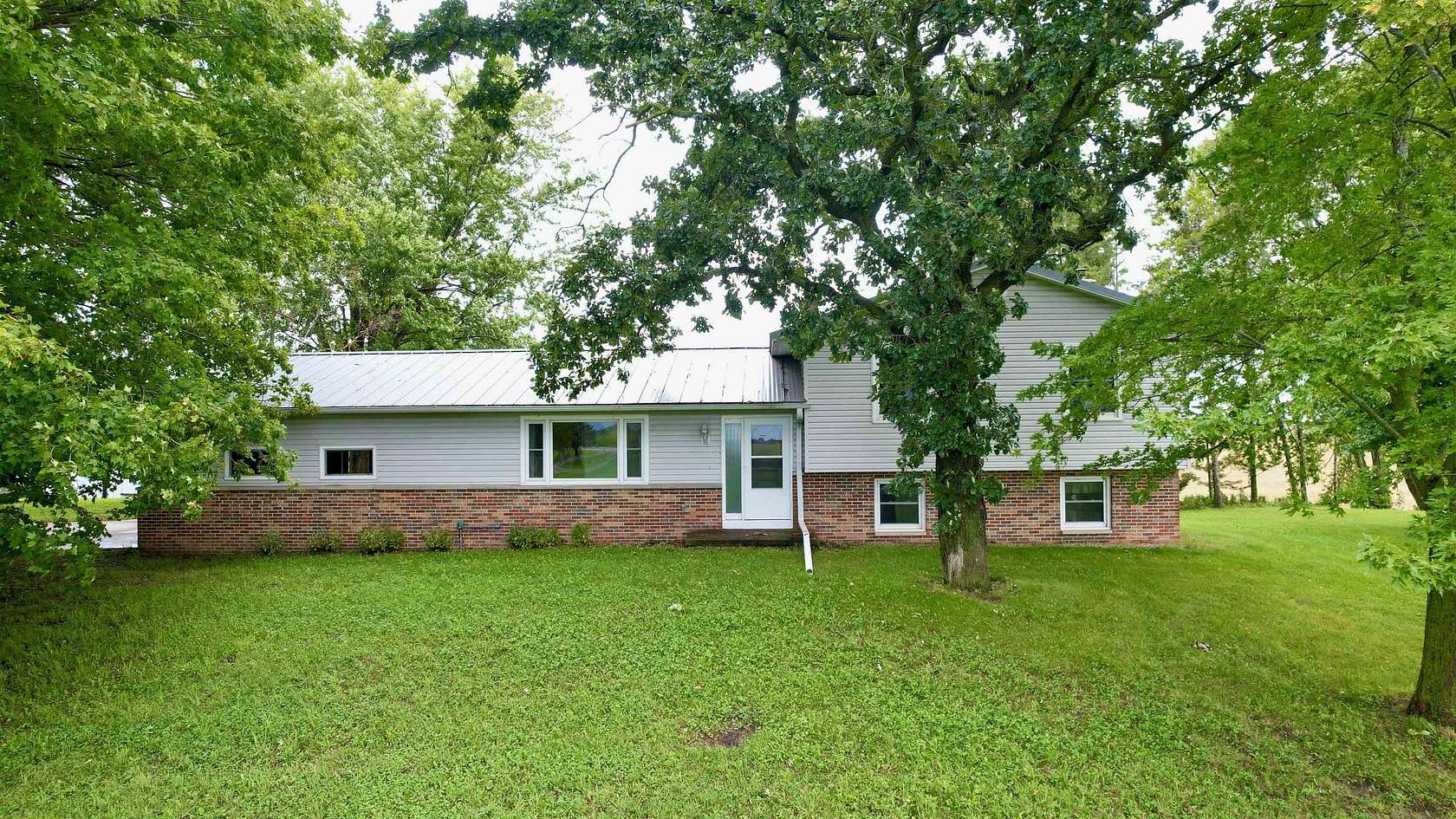5.6 Acres of Land with Home for Sale in Beaver Dam, Wisconsin