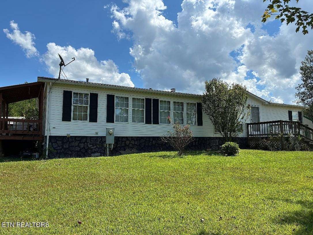5 Acres of Land with Home for Sale in Etowah, Tennessee