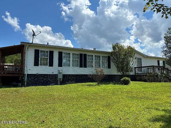 5 Acres of Land with Home for Sale in Etowah, Tennessee