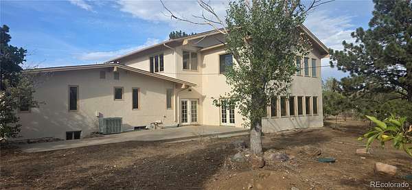 9 Acres of Land with Home for Auction in Longmont, Colorado