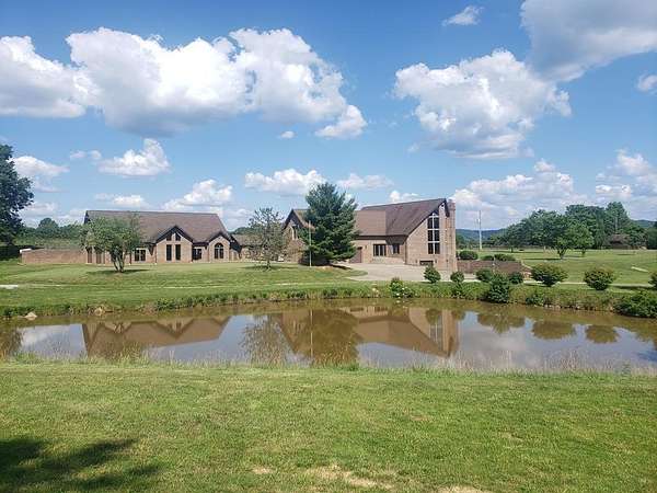 11.8 Acres of Recreational Land with Home for Sale in Stout, Ohio