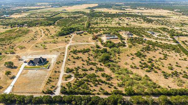7.29 Acres of Land with Home for Sale in Godley, Texas