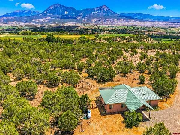 40 Acres of Land with Home for Sale in Hotchkiss, Colorado