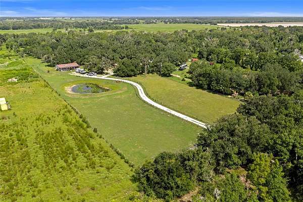 9.4 Acres of Land with Home for Sale in Myakka City, Florida