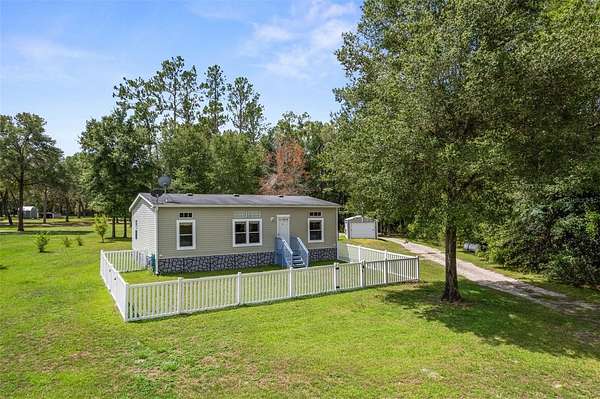 2.37 Acres of Land with Home for Sale in Dunnellon, Florida