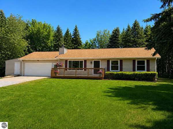 1.55 Acres of Land with Home for Sale in Grawn, Michigan