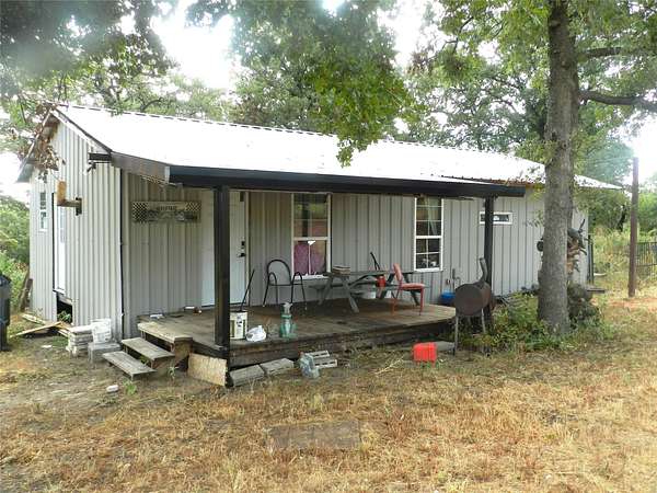 3.2 Acres of Land with Home for Sale in Springtown, Texas