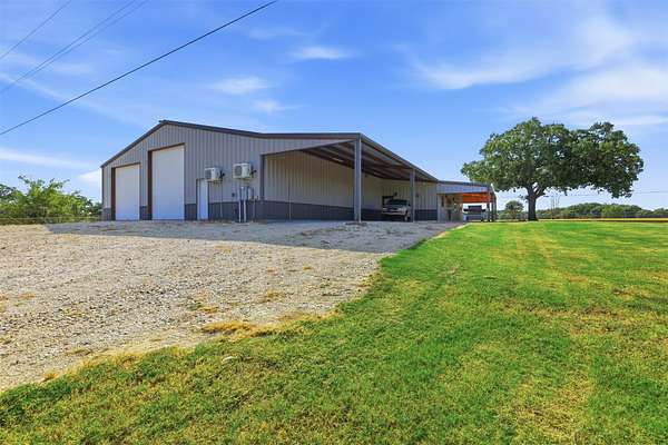 2.29 Acres of Land with Home for Sale in Tolar, Texas
