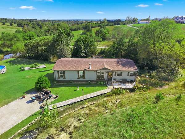 8.2 Acres of Land with Home for Sale in Stanford, Kentucky