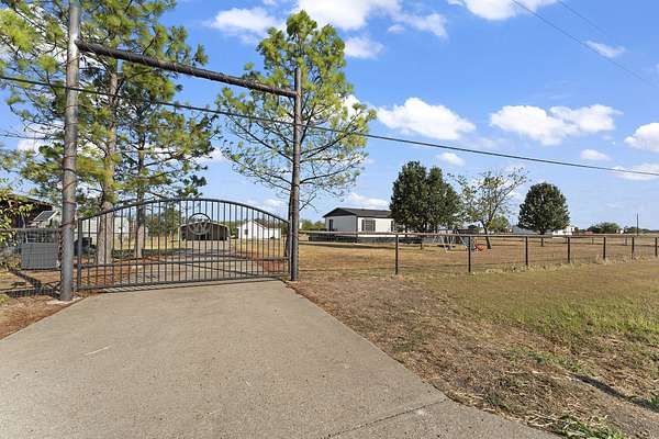 1.66 Acres of Land with Home for Sale in Terrell, Texas