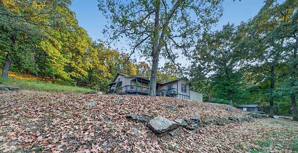 1.85 Acres of Land with Home for Sale in Locust Grove, Oklahoma