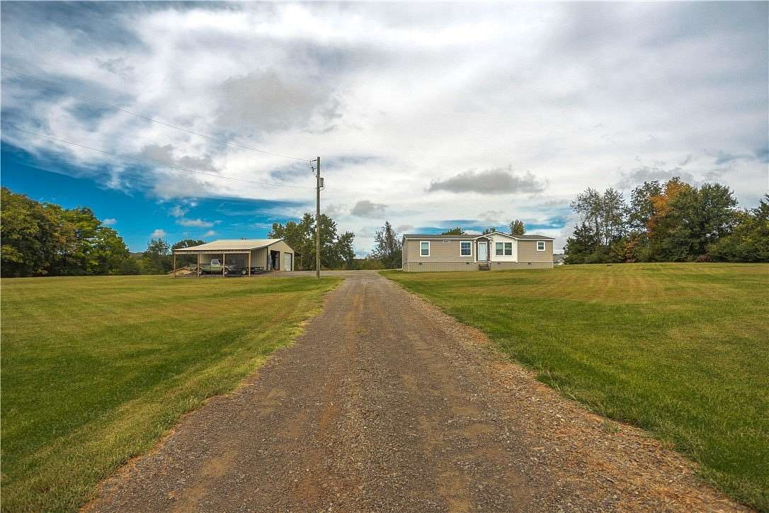 2.36 Acres of Land with Home for Sale in Russellville, Arkansas