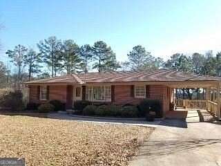 1.86 Acres of Land with Home for Sale in Woodstock, Georgia