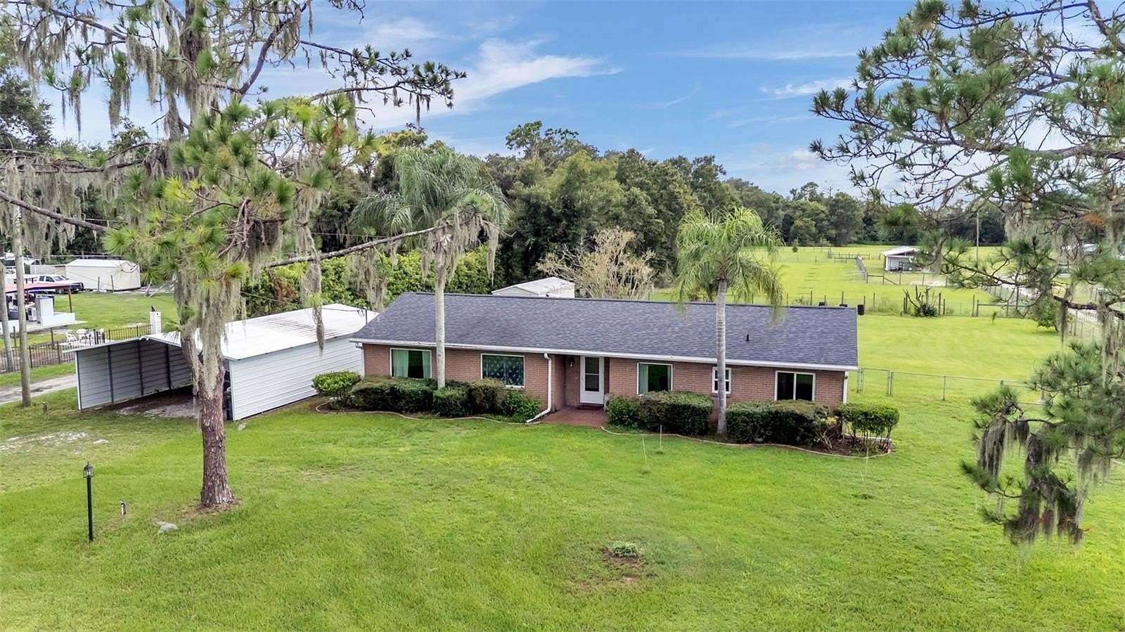1.83 Acres of Land with Home for Sale in Dover, Florida