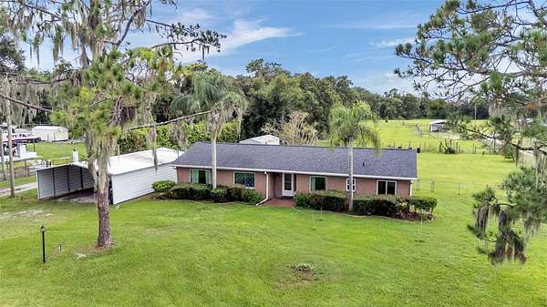 1.83 Acres of Land with Home for Sale in Dover, Florida