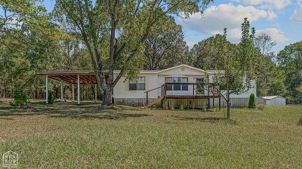 4.73 Acres of Land with Home for Sale in Jonesboro, Arkansas