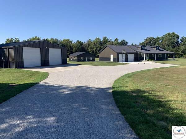 4.5 Acres of Land with Home for Sale in Cole Camp, Missouri